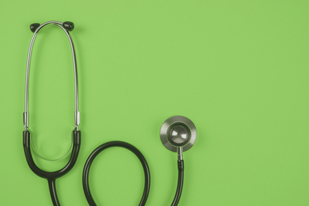 Stethoscope on pastel color background. Medical & Health Care Concept.の写真素材