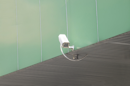 Surveillance security camera outside the buildingの写真素材