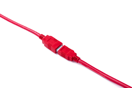 RED USB cable isolated on white backgroundの写真素材