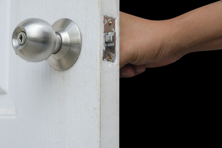 Man hand open door knobの写真素材