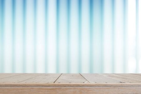 Empty wooden table and interior background, used for montage or display your productsの写真素材