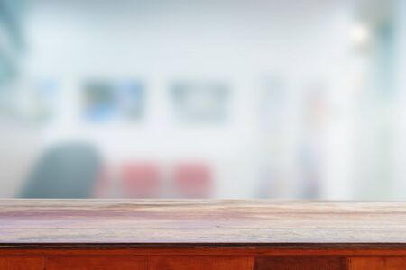 Empty wooden table and interior background, used for montage or display your productsの写真素材