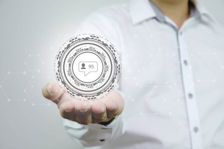 Business man hand holding social network,  virtual social media buttons
