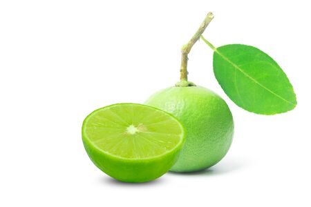 Fresh lime fruit with green leaf isolated on white backgroundの写真素材