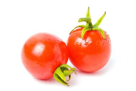 fresh cherry tomato isolated on white backgroundの写真素材