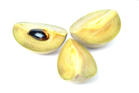 slice of sapodilla fruit isolated on white backgroundの写真素材