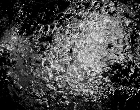 Air bubbles on black background