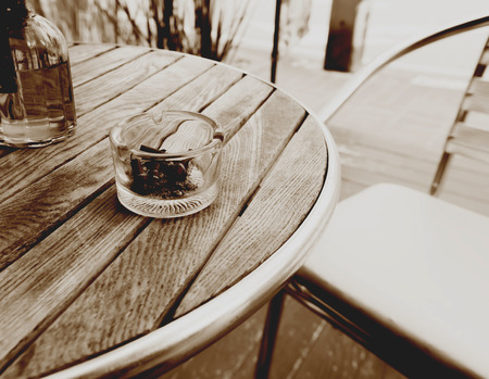 ashtray on wood table