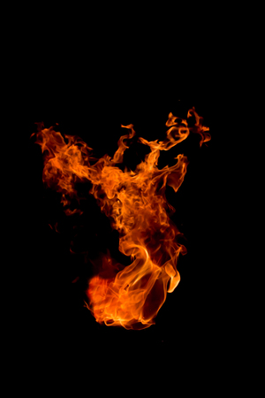 Fire flames isolated on black background.の写真素材