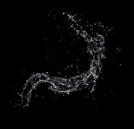 water splash isolated on black backgroundの写真素材