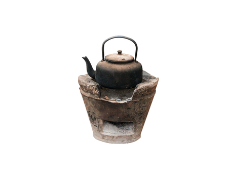 Old black kettle with black sootの写真素材