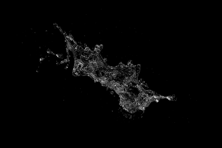 water splash isolated on black backgroundの写真素材
