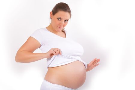 young pregant woman with baby belly tummyの写真素材