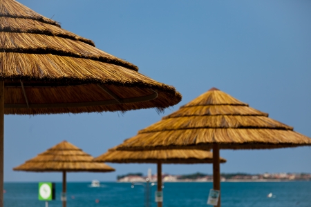 Adria  Croatia  Italia  Very nice view from the famous Porec straw Parasol to the town other side called Novigradの写真素材