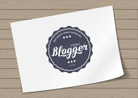 Round Badge Video Blogger with Hand Drawn Lettering Isolated on A4 Sheet Template Wooden Background.の写真素材