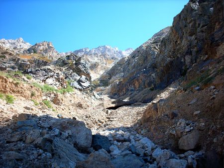 Dark and light slopes on mountain range background. Uzbekistan, fall 2004の写真素材