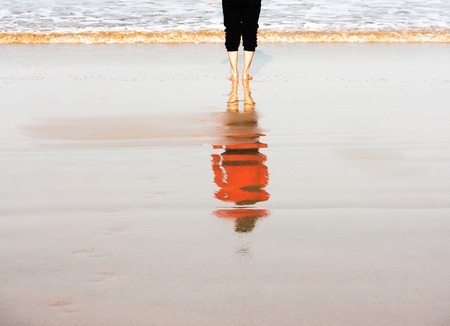 Girl in Red reflectionの写真素材