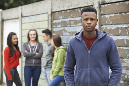 Gang Of Teenagers Hanging Out In Urban Environment Gang Of Teenagers Hanging Out In Urban Environment
