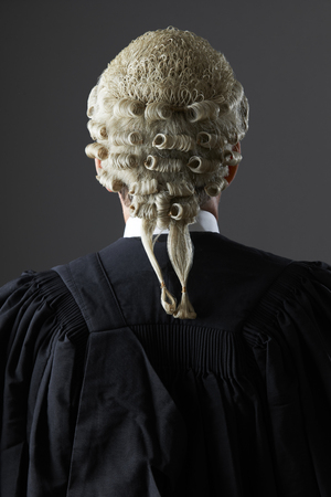 Barrister Wearing Wig And Gown From Behindの写真素材