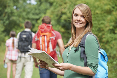 Group Of Young People Hiking In Countrysideの写真素材