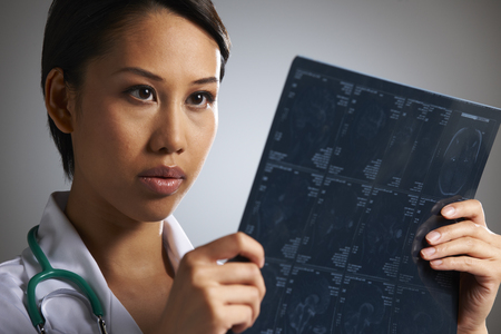 Doctor Studying Medical Scans