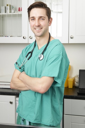 Portrait Of Vet Wearing Scrubs In Surgeryの写真素材