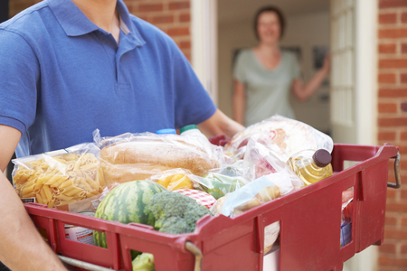 Driver Delivering Online Grocery Orderの写真素材