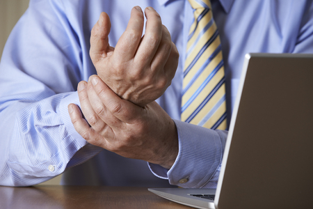 Businessman Suffering From Repetitive Strain Injury (RSI)の写真素材