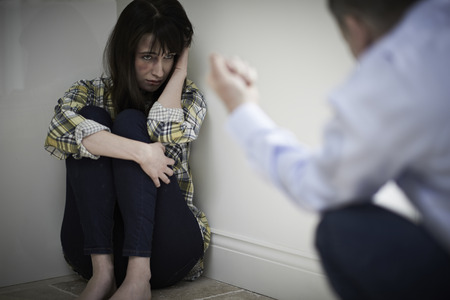 Victime Of Domestic Abuse Being Threatened By Manの写真素材