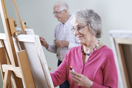 Seniors Attending Painting Class Togetherの写真素材