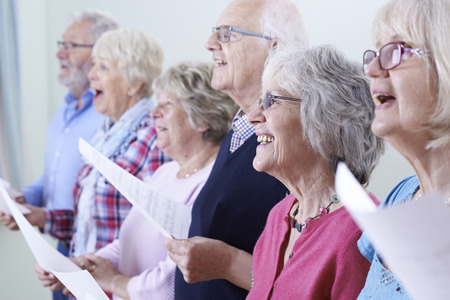 Group Of Seniors Singing In Choir Together