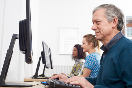 Mature Man Attending Computer Classの写真素材