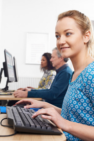 Young Woman Attending Computer Classの写真素材