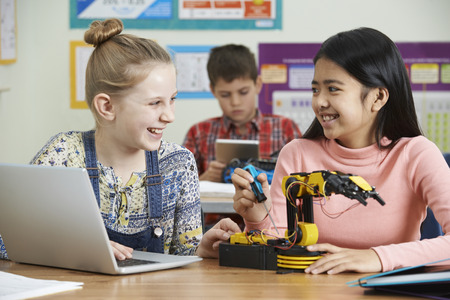 Two Female Pupils In Science Lesson Studying Roboticsの写真素材