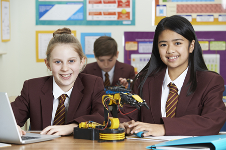 Portrait Of Female Pupils In Science Lesson Studying Roboticsの写真素材