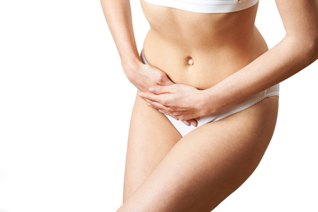 Closer Up Of Woman Wearing Underwear Suffering From Bladder Problemの写真素材