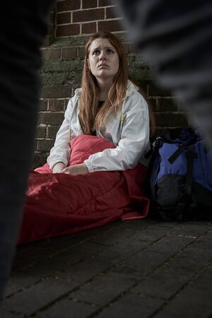 Vulnerable Teenage Girl Sleeping On The Streetの写真素材