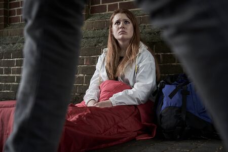 Vulnerable Teenage Girl Sleeping On The Streetの写真素材