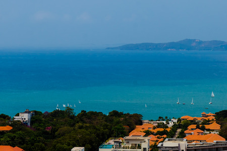Pattaya view to Koh Larn island with a group of boatsの写真素材