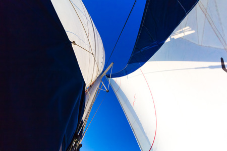 Sails and mast over blue sky backgroundの写真素材