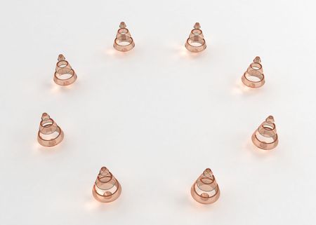 Eight 3d glass shapes standing in a circle on a white surface