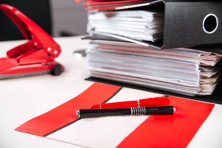 Office working place folders red colour table, horizontal