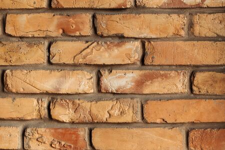 the Background texture of the Old orange Brick Wall. With old dirty and vintage style pattern