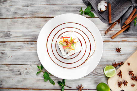 Top view on gourmet sweet dessert candied fruit cheesecake on a decorated plate, gourmetの写真素材