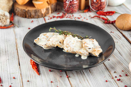 Tender turkey fillet steak in cream sauce with rosemary, horizontalの写真素材