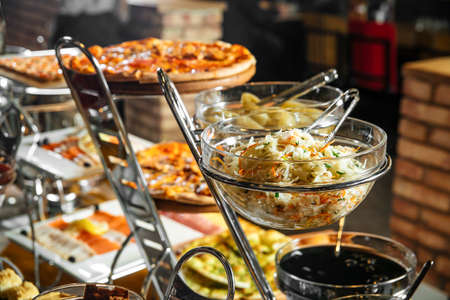 Restaurant lunch catering buffet with different salads