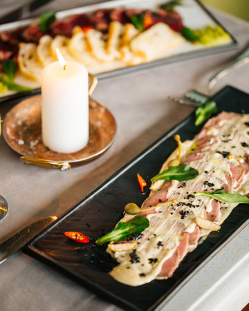 Appetizer vitello tonnato with beef and sauceの写真素材