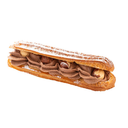 Isolated hazelnut eclair brewing cake on white