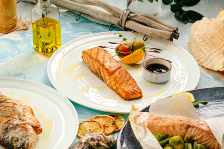 Served gourmet grilled salmon steak with sauceの写真素材