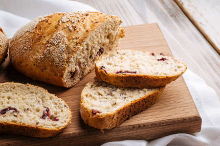 Closeup on sliced muesli cereal bread on the board